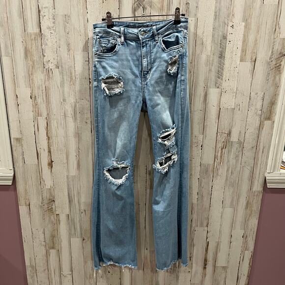 American Eagle Super Hi Rise Flare Peekaboo Lace Pocket Distressed Jeans Size 6 - Picture 1 of 10